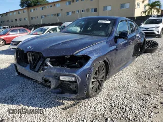 2021 BMW X6 M50i with VIN 5UXCY8C09M9E66884, listed as a Copart auction lot 63025622 with 26,220 mi miles and Salvage Title. Bid and sale history available at carsss.com. Image 2.