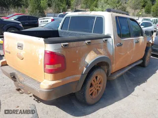 2008 Ford Explorer Sport Trac XLT with VIN 1FMEU31E48UA44850, listed as a IAAI auction lot 42020620 with 122,205 mi miles. Bid and sale history available at carsss.com. Image 4.