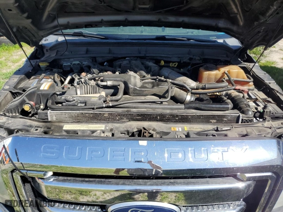 2011 Ford Super Duty F-350 DRW XL with VIN 1FT8W3DT4BEA29465, listed as a Copart auction lot 58611844 with 336,065 mi miles and Salvage Title. Bid and sale history available at carsss.com. Image 12.