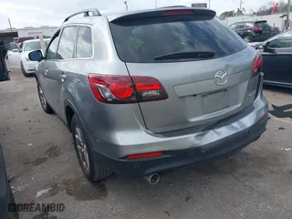 2015 Mazda CX-9 Touring with VIN JM3TB2CA6F0457189, listed as a IAAI auction lot 41529631 with 117,444 mi miles. Bid and sale history available at carsss.com. Image 3.