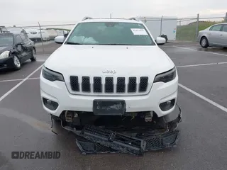 2021 Jeep Cherokee Latitude Lux z VIN 1C4PJMMX4MD221786, wystawiony jako IAAI lot #42432825 z przebiegiem 54 297 mil mil oraz . Historia ofert i sprzedaży dostępna na DreamBid. Obrazek 12.
