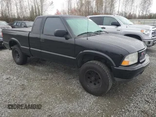 1999 GMC Sonoma SLS with VIN 1GTCS19X1X8503254, listed as a Copart auction lot 77546124 with 121,345 mi miles and Clean Title. Bid and sale history available at carsss.com. Image 4.