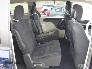 2015 Dodge Grand Caravan SXT with VIN 2C4RDGCG7FR524712, listed as a IAAI auction lot 41956063 with 111,144 mi miles and . Bid and sale history available at DreamBid. Image 8.