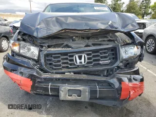 2014 Honda Ridgeline Sport with VIN 5FPYK1F7XEB008758, listed as a Copart auction lot 51022445 with 197,006 mi miles and Salvage title. Bid and sale history available at DreamBid. Image 5.