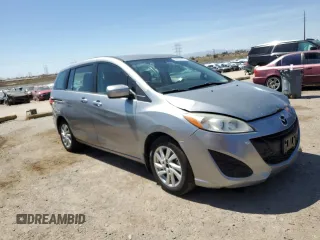 2012 Mazda 5 Sport with VIN JM1CW2BL3C0105912, listed as a Copart auction lot 50938335 with 117,479 mi miles and Salvage Title. Bid and sale history available at DreamBid. Image 4.