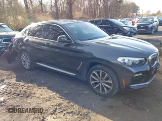 2019 BMW X4 xDrive30i z VIN 5UXUJ3C51KLG52460, wystawiony jako IAAI lot #41906197 z przebiegiem 174 938 mil mil oraz . Historia ofert i sprzedaży dostępna na DreamBid. Obrazek 1.