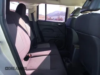 2009 Jeep Patriot Sport with VIN 1J4FT28A99D155530, listed as a IAAI auction lot 41753248 with 194,518 mi miles and . Bid and sale history available at DreamBid. Image 8.