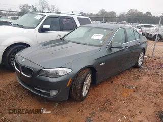 2012 BMW 5 Series 528i with VIN WBAXG5C53CDY28309, listed as a IAAI auction lot 41064233 with 129,915 mi miles. Bid and sale history available at carsss.com. Image 2.