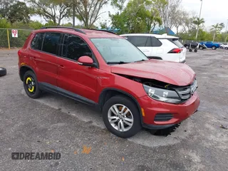 2015 Volkswagen Tiguan R-Line with VIN WVGAV7AXXFW106001, listed as a IAAI auction lot 41652896 with 131,031 mi miles and . Bid and sale history available at DreamBid. Image 1.