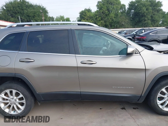 2019 Jeep Cherokee Latitude with VIN 1C4PJLCBXKD416644, listed as a IAAI auction lot 42261057 with 93,849 mi miles and . Bid and sale history available at DreamBid. Image 14.