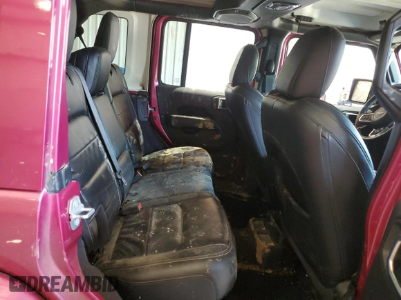2022 Jeep Wrangler Unlimited Sahara with VIN 1C4HJXEN0NW106045, listed as a Copart auction lot 52383455 with 104,937 mi miles and Salvage title. Bid and sale history available at DreamBid. Image 12.