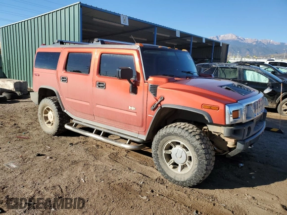 2003 Hummer H2 with VIN 5GRGN23U33H125797, listed as a Copart auction lot 77170554 with 166,739 mi miles and Clean Title. Bid and sale history available at carsss.com. Image 4.