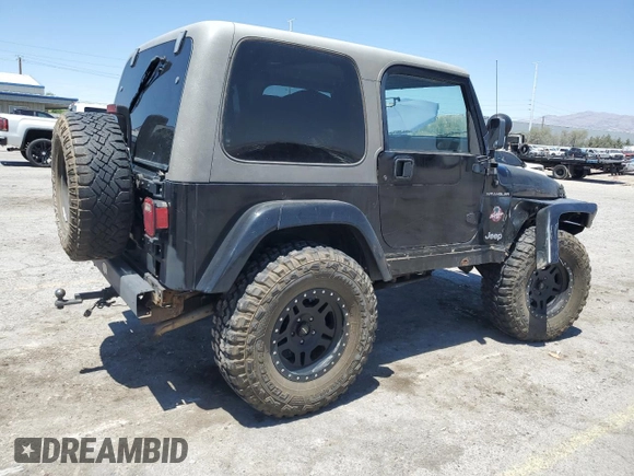 1999 Jeep Wrangler Sahara with VIN 1J4FY49S8XP472733, listed as a Copart auction lot 58174915 with 170,838 mi miles and Salvage title. Bid and sale history available at DreamBid. Image 3.