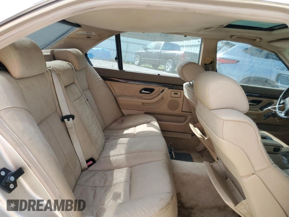 1998 BMW 7 Series 740il with VIN WBAGJ8323WDM24309, listed as a Copart auction lot 65705964 with 206,422 mi miles and Clean Title. Bid and sale history available at carsss.com. Image 10.