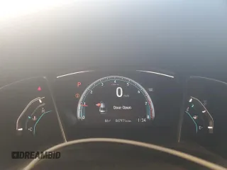 2018 Honda Civic EX с VIN 2HGFC2F73JH600074, выставлен на аукционе Copart как лот 57061815 с пробегом 47 971 миль миль и Списание • Salvage title. История ставок и продаж доступна на DreamBid. Изображение 9.