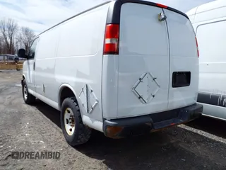 2014 Chevrolet Express Cargo Van with VIN 1GCWGFCA0E1205946, listed as a IAAI auction lot 41685687 with 317,212 mi miles. Bid and sale history available at carsss.com. Image 3.