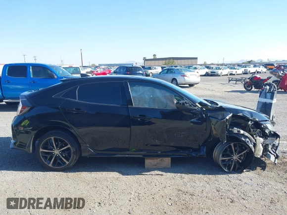 2021 Honda Civic Sport with VIN SHHFK7H48MU415898, listed as a IAAI auction lot 42130231 with 56,315 mi miles and . Bid and sale history available at DreamBid. Image 14.
