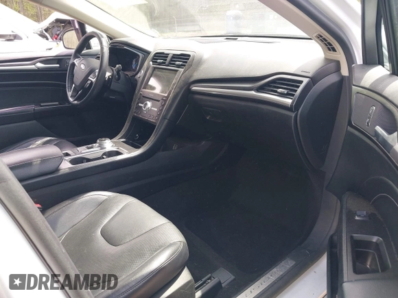 2019 Ford Fusion Titanium with VIN 3FA6P0D91KR140260, listed as a IAAI auction lot 41931629 with 95,207 mi miles. Bid and sale history available at carsss.com. Image 5.