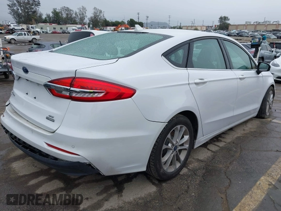 2020 Ford Fusion SE z VIN 3FA6P0LU2LR253612, wystawiony jako IAAI lot #41798850 z przebiegiem 58 219 mil mil oraz . Historia ofert i sprzedaży dostępna na DreamBid. Obrazek 4.