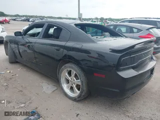 2013 Dodge Charger SXT Plus with VIN 2C3CDXHG4DH574361, listed as a IAAI auction lot 42048854 with 178,735 mi miles. Bid and sale history available at carsss.com. Image 3.