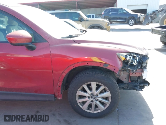 2013 Mazda CX-5 Touring with VIN JM3KE2CE9D0117750, listed as a IAAI auction lot 41858518 with 90,610 mi miles and . Bid and sale history available at carsss.com. Image 6.