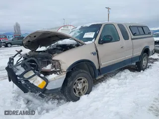 1998 Ford F-150 Standard with VIN 1FTZX18W5WKB97701, listed as a IAAI auction lot 41254873 with 291,523 mi miles. Bid and sale history available at carsss.com. Image 17.