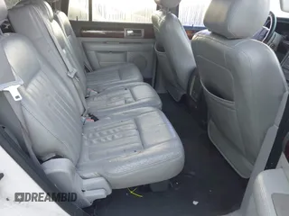 2004 Lincoln Navigator Luxury with VIN 5LMFU27RX4LJ34879, listed as a IAAI auction lot 42024945 with 154,667 mi miles. Bid and sale history available at carsss.com. Image 8.