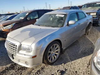 2006 Chrysler 300 C SRT8 with VIN 2C3LA73W06H471013, listed as a Copart auction lot 74204434 with 12,015 mi miles and Salvage Title. Bid and sale history available at carsss.com. Image 1.