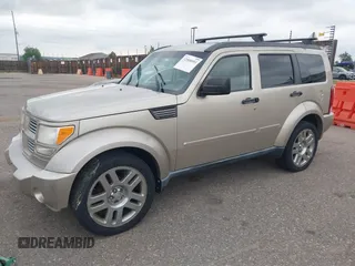2010 Dodge Nitro Heat with VIN 1D4PT4GK7AW156722, listed as a IAAI auction lot 42508953 with 283,690 mi miles and . Bid and sale history available at DreamBid. Image 2.
