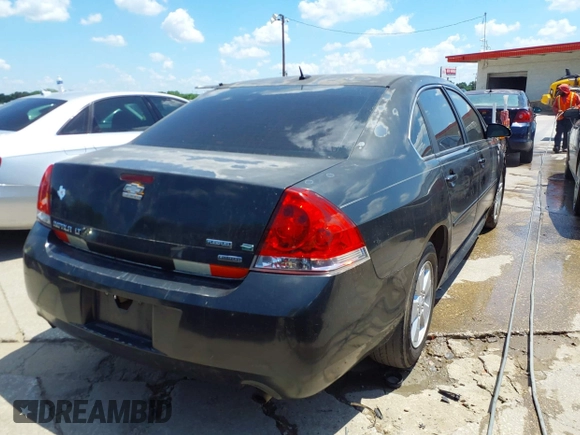 2014 Chevrolet Impala LT with VIN 2G1WB5E31E1106255, listed as a IAAI auction lot 41960424 with 235,070 mi miles and . Bid and sale history available at DreamBid. Image 4.