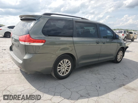 2014 Toyota Sienna XLE with VIN 5TDYK3DC2ES439353, listed as a Copart auction lot 54332275 with 130,312 mi miles and Salvage Title. Bid and sale history available at DreamBid. Image 3.