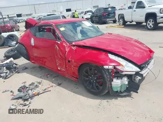 2013 Nissan 370Z Touring z VIN JN1AZ4EH7DM382156, wystawiony jako IAAI lot #42162391 z przebiegiem 70 265 mil mil oraz . Historia ofert i sprzedaży dostępna na DreamBid. Obrazek 1.