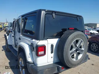 2019 Jeep Wrangler Unlimited Sahara with VIN 1C4HJXEG0KW577917, listed as a IAAI auction lot 41993670 with 90,584 mi miles and . Bid and sale history available at DreamBid. Image 3.