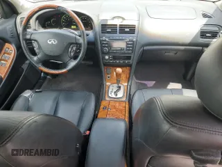 2003 Infiniti I35 Luxury z VIN JNKDA31A43T113863, wystawiony jako Copart lot #58551715 z przebiegiem 78 871 mil mil oraz Szkoda całkowita • Salvage title. Historia ofert i sprzedaży dostępna na DreamBid. Obrazek 8.