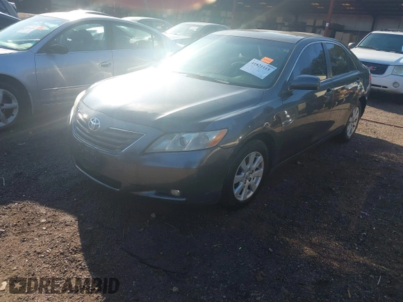 2009 Toyota Camry LE with VIN 4T1BK46K79U088078, listed as a IAAI auction lot 41821115 with 157,665 mi miles. Bid and sale history available at carsss.com. Image 2.