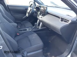 2023 Toyota Corolla Cross Hybrid S with VIN 7MUFBABG3PV005338, listed as a IAAI auction lot 41633311 with 32,082 mi miles and . Bid and sale history available at DreamBid. Image 5.