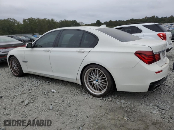 2015 BMW 7 Series 750i z VIN WBAYA8C5XFD825662, wystawiony jako Copart lot #78850474 z przebiegiem 153 080 mil mil oraz Czysty tytuł • Clean title. Historia ofert i sprzedaży dostępna na DreamBid. Obrazek 2.