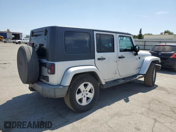 2007 Jeep Wrangler Unlimited Sahara with VIN 1J8GA59137L181360, listed as a Copart auction lot 62311225 with 151,393 mi miles and Salvage title. Bid and sale history available at DreamBid. Image 3.