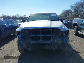 2018 Ram 1500 Big Horn with VIN 1C6RR7GT6JS106424, listed as a IAAI auction lot 41459931 with 145,284 mi miles and . Bid and sale history available at DreamBid. Image 12.