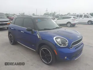 2015 MINI Cooper Countryman S with VIN WMWZC5C50FWP47426, listed as a IAAI auction lot 42108546 with 103,281 mi miles. Bid and sale history available at carsss.com. Image 1.