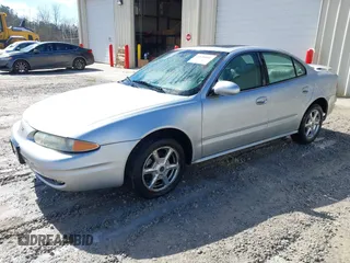2002 Oldsmobile Alero GLS z VIN 1G3NF52E92C217607, wystawiony jako IAAI lot #41628081 z przebiegiem 78 658 mil mil oraz . Historia ofert i sprzedaży dostępna na DreamBid. Obrazek 2.