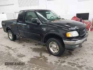 2000 Ford F-150 XL with VIN 1FTRX18W9YNB67215, listed as a IAAI auction lot 42558112 with 118,628 mi miles and . Bid and sale history available at DreamBid. Image 1.