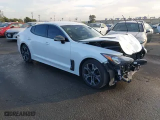 2021 Kia Stinger GT-Line with VIN KNAE15LAXM6091993, listed as a IAAI auction lot 40996390 with NaN miles. Bid and sale history available at carsss.com. Image 1.