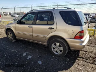 2005 Mercedes-Benz M 500 with VIN 4JGAB75E85A529110, listed as a Copart auction lot 80557034 with 130,560 mi miles and Salvage title. Bid and sale history available at DreamBid. Image 2.