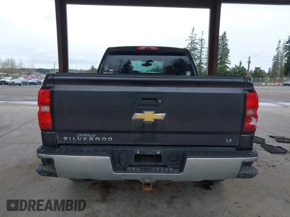 2015 Chevrolet Silverado 1500 LT with VIN 1GCVKREC3FZ430536, listed as a IAAI auction lot 41910194 with 131,541 mi miles. Bid and sale history available at carsss.com. Image 16.