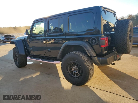 2022 Jeep Wrangler Unlimited High Tide with VIN 1C4HJXDG0NW247152, listed as a Copart auction lot 82371674 with 32,417 mi miles and Salvage Title. Bid and sale history available at DreamBid. Image 2.
