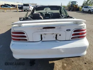 1994 Ford Mustang with VIN 1FALP45T8RF205391, listed as a Copart auction lot 54699065 with 167,335 mi miles and Salvage title. Bid and sale history available at DreamBid. Image 6.
