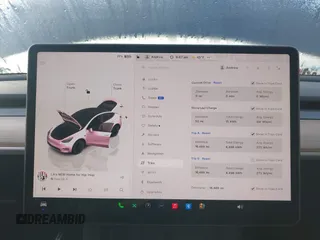 2023 Tesla Model Y Long Range with VIN 7SAYGDEE7PA196038, listed as a IAAI auction lot 41459601 with 16,489 mi miles and . Bid and sale history available at DreamBid. Image 7.
