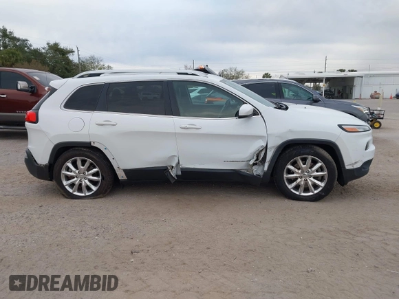 2016 Jeep Cherokee Limited with VIN 1C4PJMDB6GW170207, listed as a IAAI auction lot 41346028 with 115,525 mi miles and . Bid and sale history available at DreamBid. Image 13.