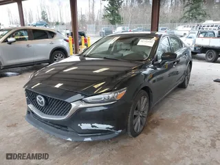 2021 Mazda Mazda6 Touring with VIN JM1GL1VM2M1604415, listed as a IAAI auction lot 41742448 with 103,776 mi miles. Bid and sale history available at carsss.com. Image 17.